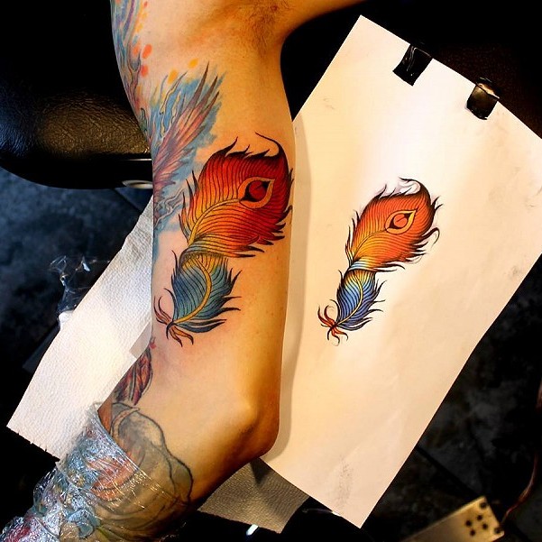 Colorful feather tattoo