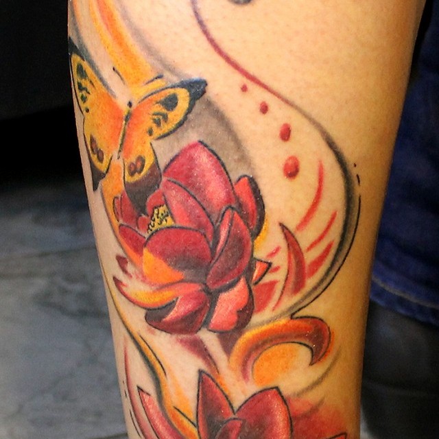Flowers and butterfly tattoo