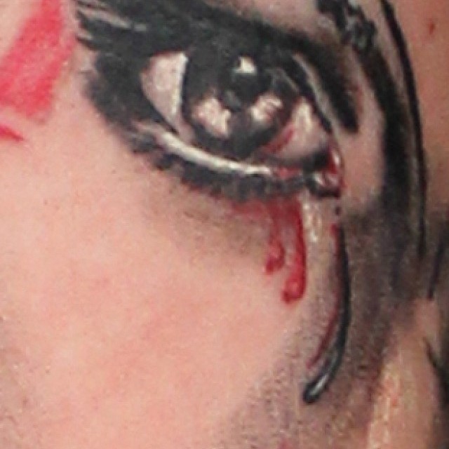 Eye, blood and tears tattoo